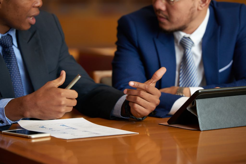 Real estate agents and lawyers collaborating